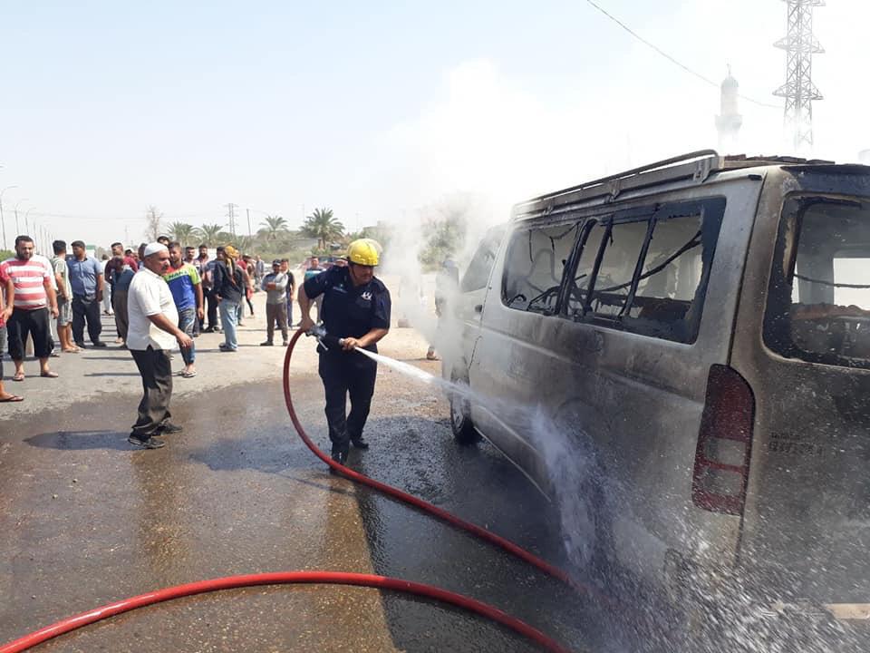 بالصور.. إخماد حريق اندلع داخل باص لنقل الركاب على طريق ديالى ـ بغداد